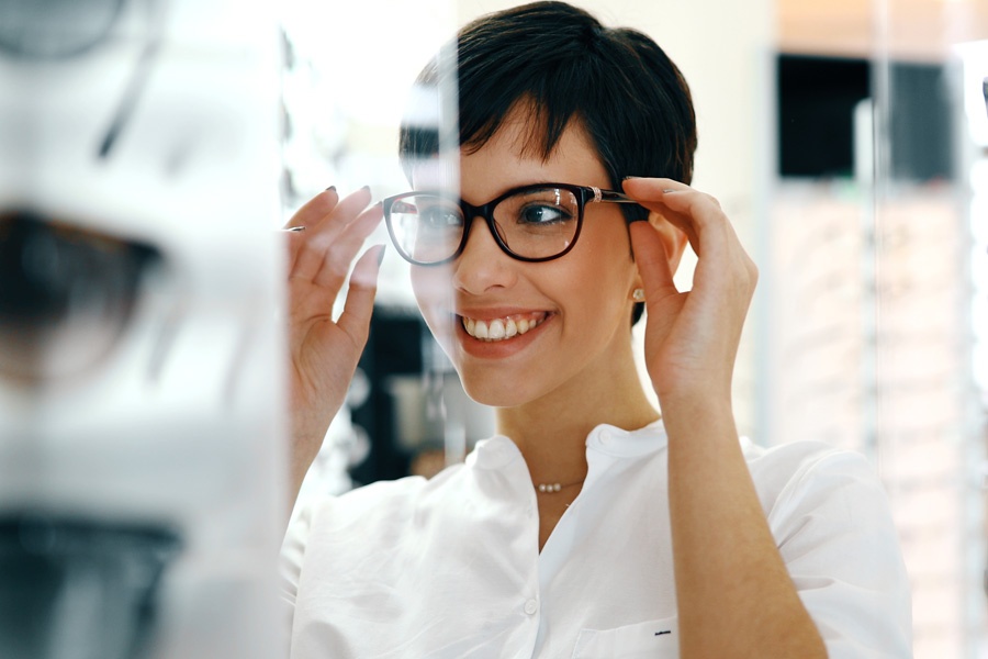 Group Vision Insurance Woman Picking Out New Glasses